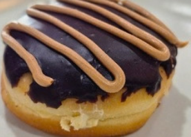 The Elvis Donut: chocolate glaze with a peanut-butter drizzle